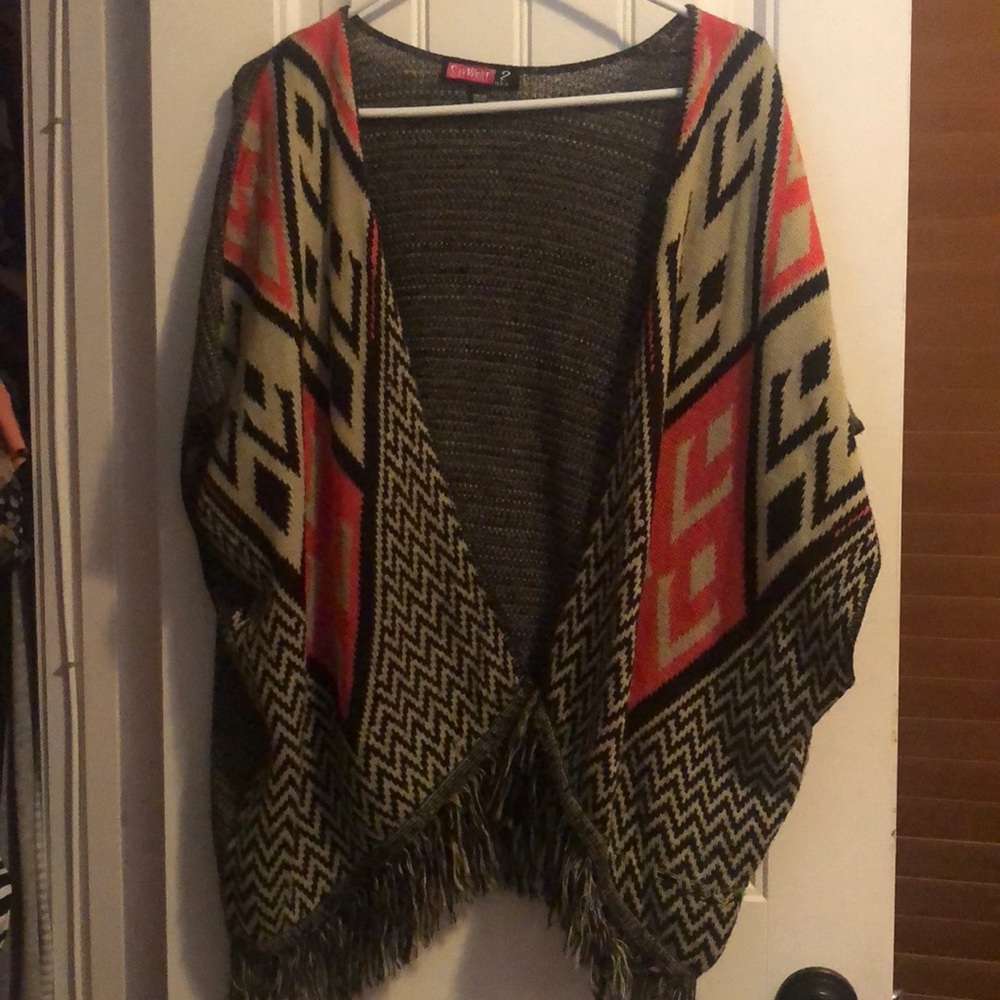 Beautiful one size fits a all poncho!